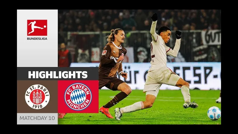 Cầu thủ Bayern Munich với chiếc áo đỏ đang cố gắng vượt qua phòng ngự của St. Pauli trong trận đấu Cầu thủ Bayern Munich với chiếc áo đỏ đang cố gắng vượt qua phòng ngự của St. Pauli trong…